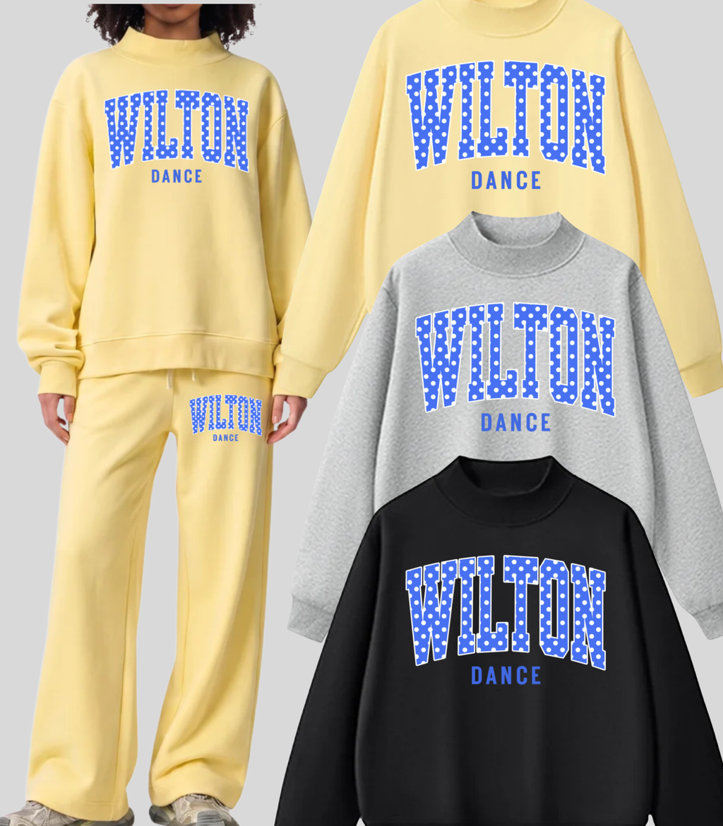 Wilton Polka Dot Dance mock neck sweatshirt in yellow, gray, and black with royal blue and white varsity design