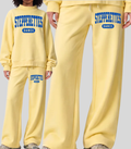Wilton Stepperettes Dance wide leg sweatpants with royal blue collegiate Stepperettes design on the upper leg