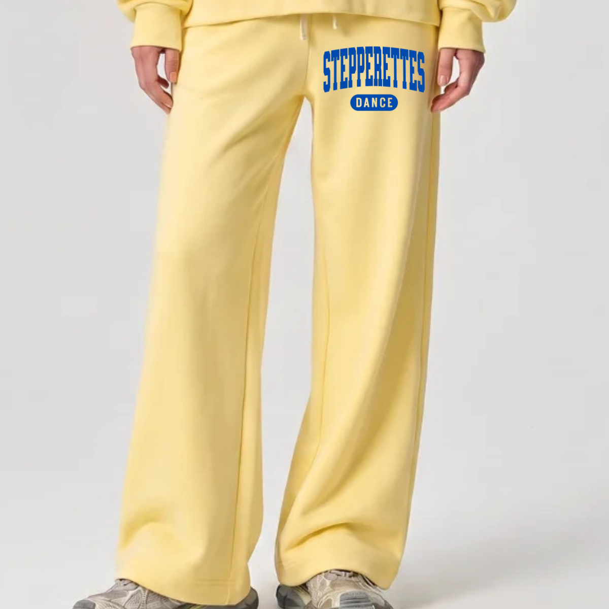 Wilton Stepperettes Dance wide leg sweatpants with royal blue collegiate Stepperettes design on the upper leg